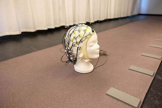 EEG cap on a carpet