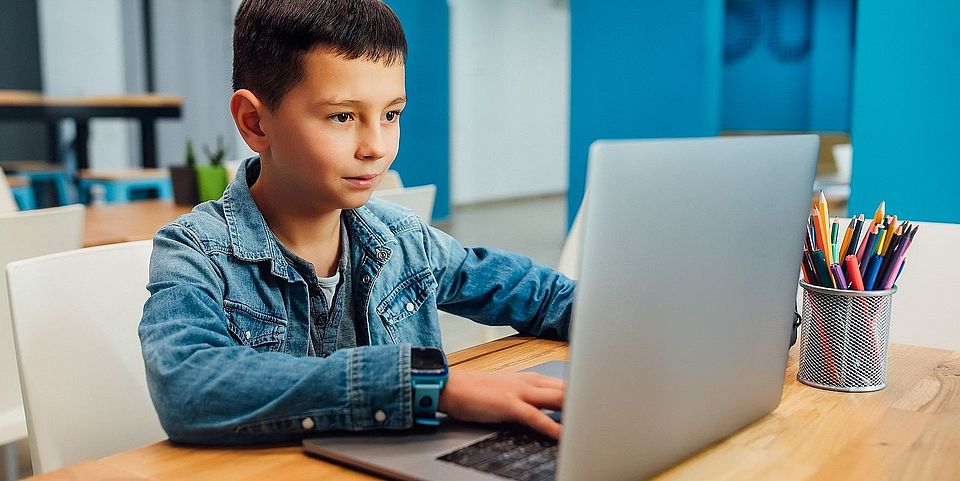 child with laptop